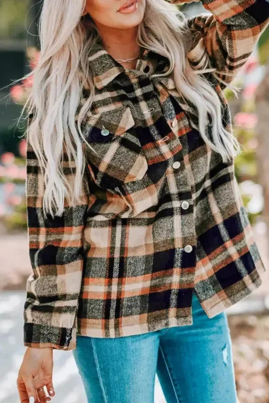 Woman wearing orange oversized plaid shacket with button front in relaxed layering silhouette Fashionfitz UK