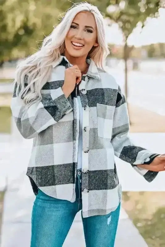 Front view of gray plaid button down shacket with chest pocket, styled for a trendy and breathable fall outfit.