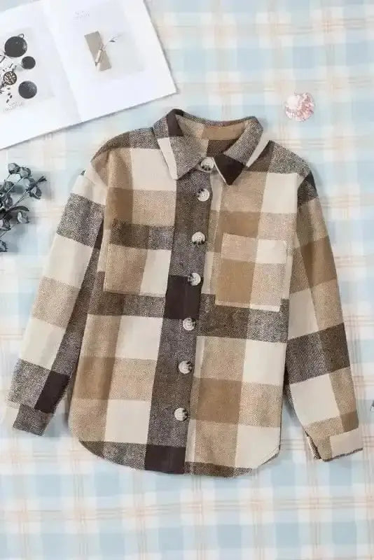 Flat lay of khaki and brown plaid button down shacket with front pocket and large buttons, perfect for daily casual wear.