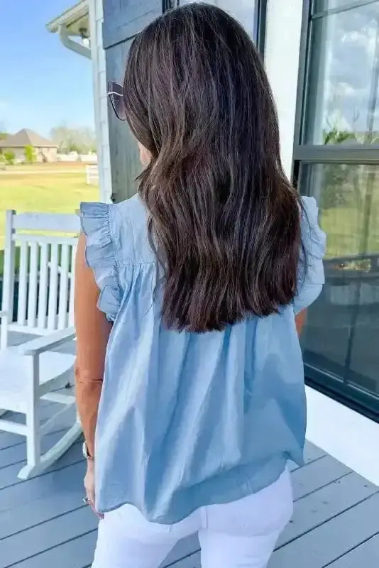 Back view of Azure Blue Ruffle Sleeve Colour Block Blouse showing structured sleeveless silhouette — Fashionfitz