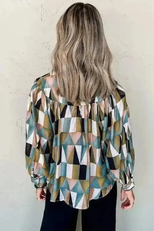 Back view of Geometric Print Balloon Sleeve Loose Fit Top showing shirt collar and loose 81% viscose silhouette — Fashionfitz