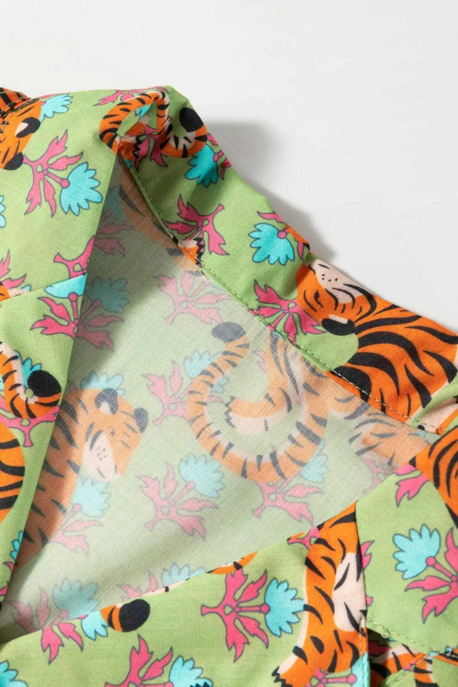 Close-up of Tiger Print Casual Shirt Blouse showing bold tiger and floral print pattern in vivid green on 100% polyester — Fashionfitz