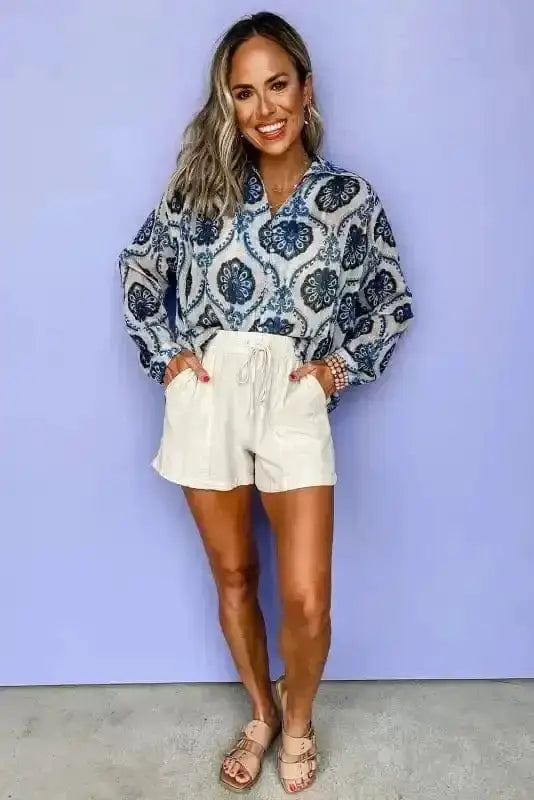 Close-up of Floral Print Boho Loose Fit Button-Up Shirt showing vibrant blue floral boho print and button-front detail — Fashionfitz
