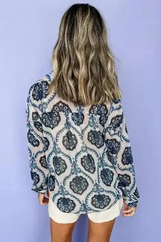 Back view of Floral Print Boho Loose Fit Button-Up Shirt showing generous relaxed fit and long sleeves — Fashionfitz