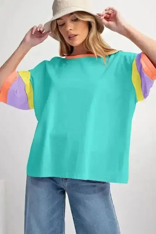 Side view of Green Oversized Patchwork Stitched T-Shirt showing artisan stitching detail and relaxed fit — Fashionfitz