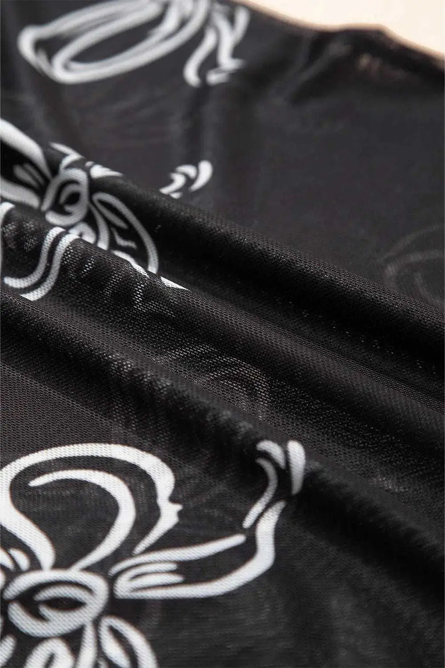 Close-up of Black Bow Mesh Sheer Top showing distinctive bow construction on breathable black mesh fabric — Fashionfitz