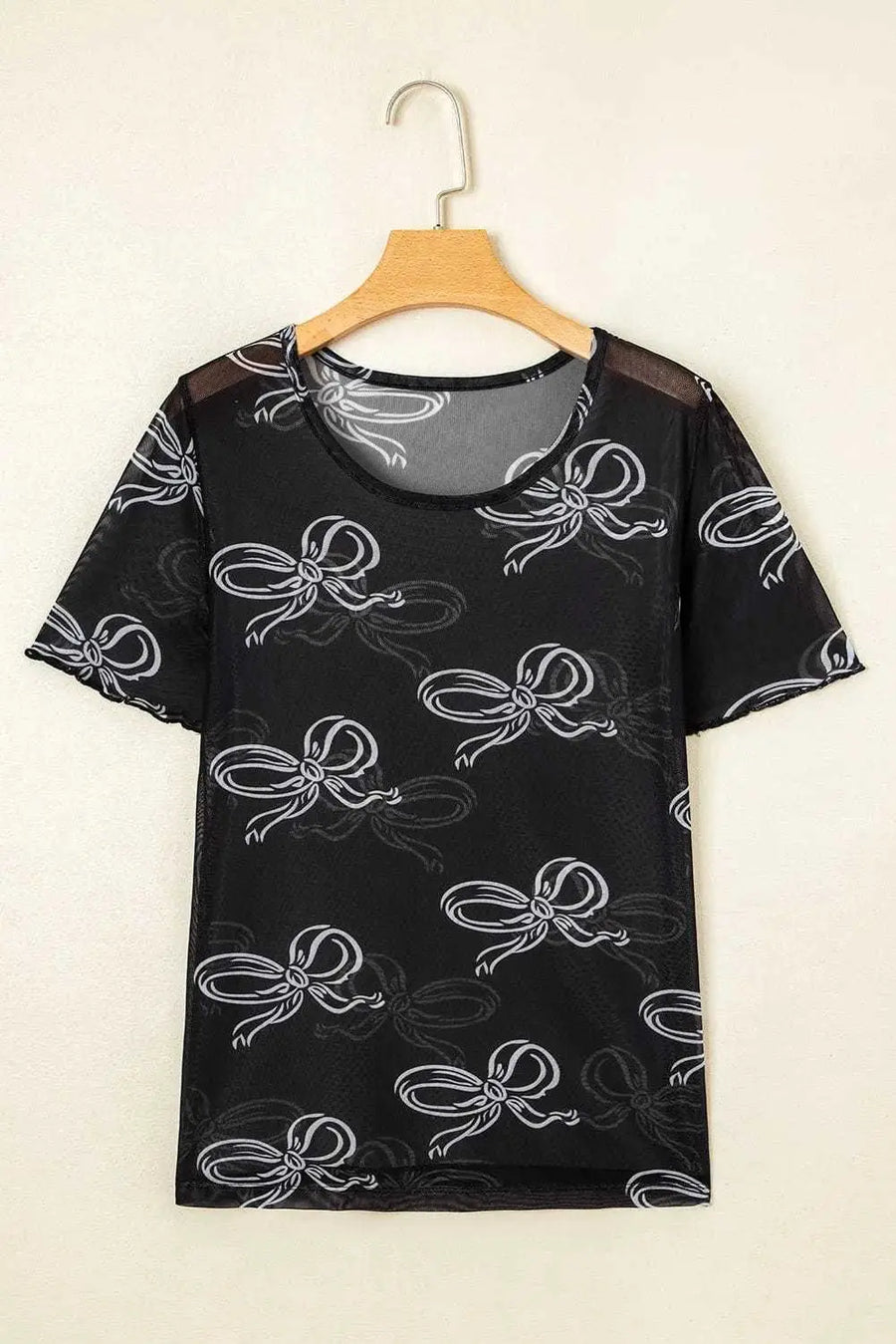 Side view of Black Bow Mesh Sheer Top showing bow detail and mesh silhouette — Fashionfitz