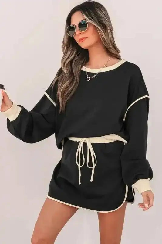 Two Piece Dresses Noir Chic Pullover and Skort Set
