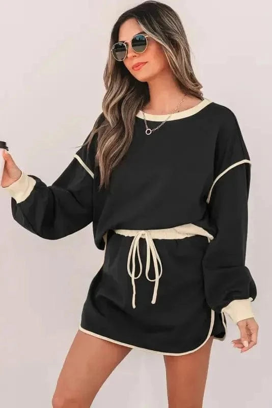 Two Piece Dresses Noir Chic Pullover and Skort Set