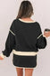 Two Piece Dresses Noir Chic Pullover and Skort Set