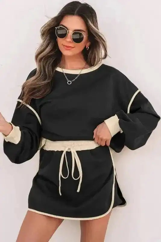 Two Piece Dresses Noir Chic Pullover and Skort Set