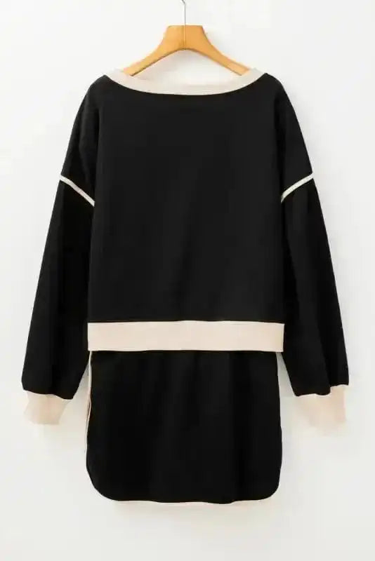 Two Piece Dresses Noir Chic Pullover and Skort Set