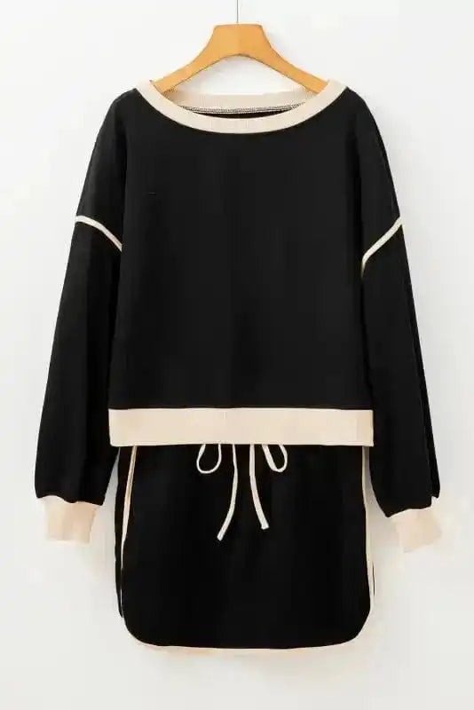 Two Piece Dresses Noir Chic Pullover and Skort Set