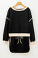 Two Piece Dresses Noir Chic Pullover and Skort Set