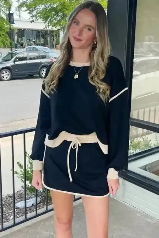 Two Piece Dresses Noir Chic Pullover and Skort Set
