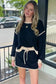 Two Piece Dresses Noir Chic Pullover and Skort Set