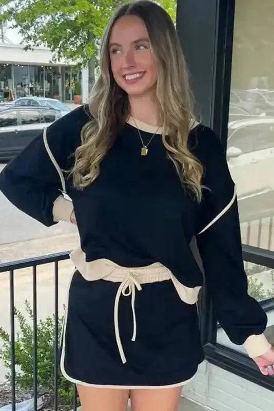 Two Piece Dresses Noir Chic Pullover and Skort Set