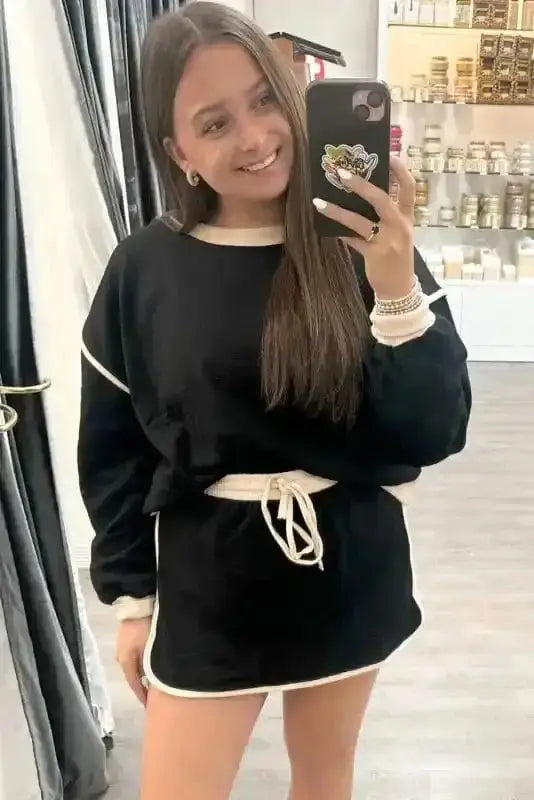 Two Piece Dresses Noir Chic Pullover and Skort Set