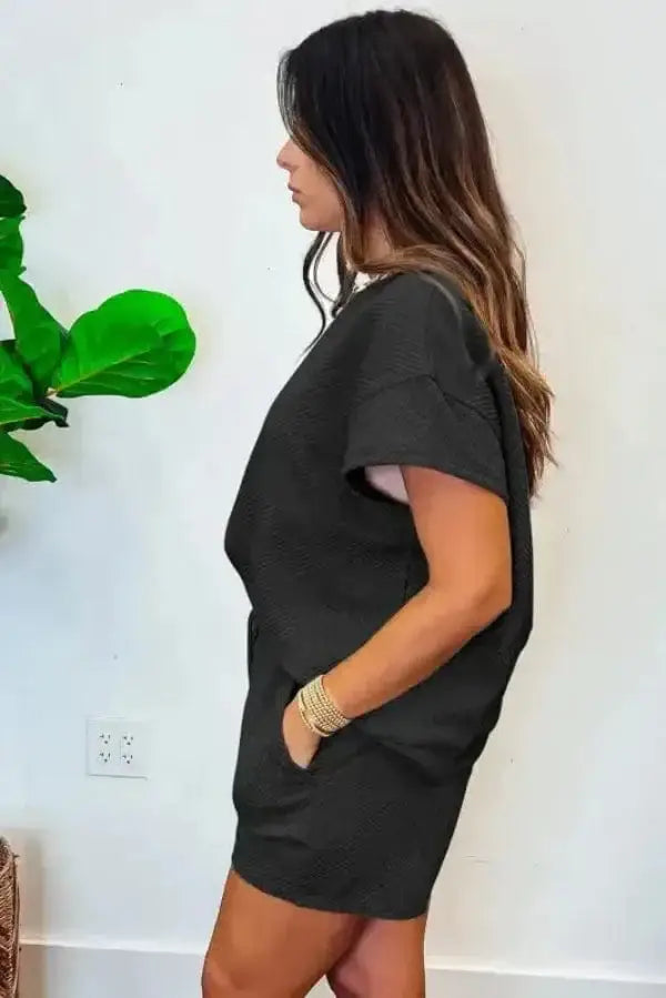 Side view of black ribbed two piece shorts outfit showing relaxed fit and pocketed shorts Fashionfitz UK