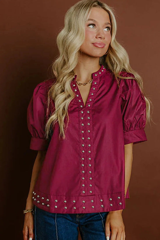 Short puff sleeve detail on burgundy rivet embellished V-neck blouse | Fashionfitz