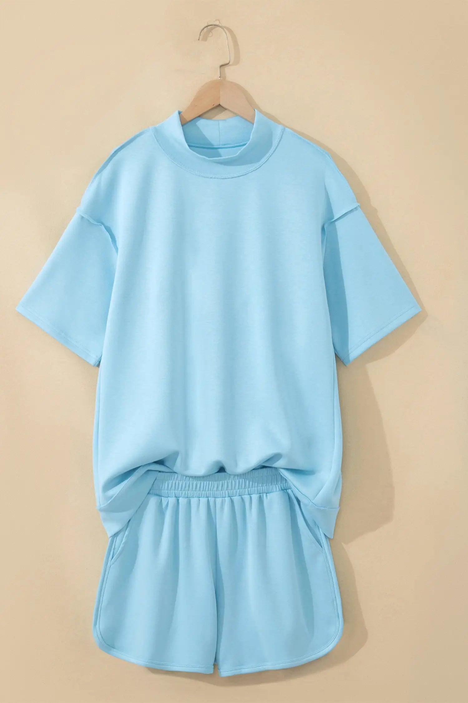 Exposed seam mock neck oversized tee shorts two piece set pockets outfit sets