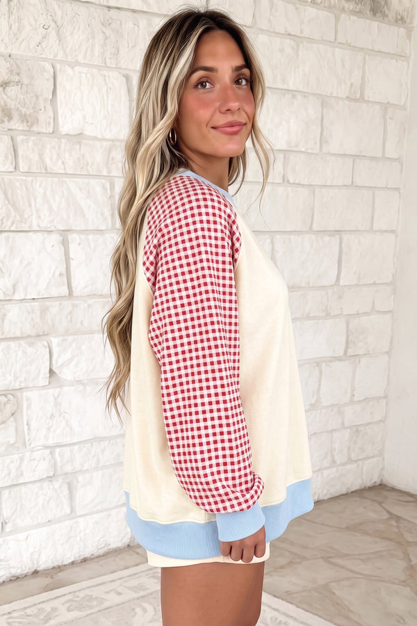 Beige colour block raglan pullover UK side view styled with jeans