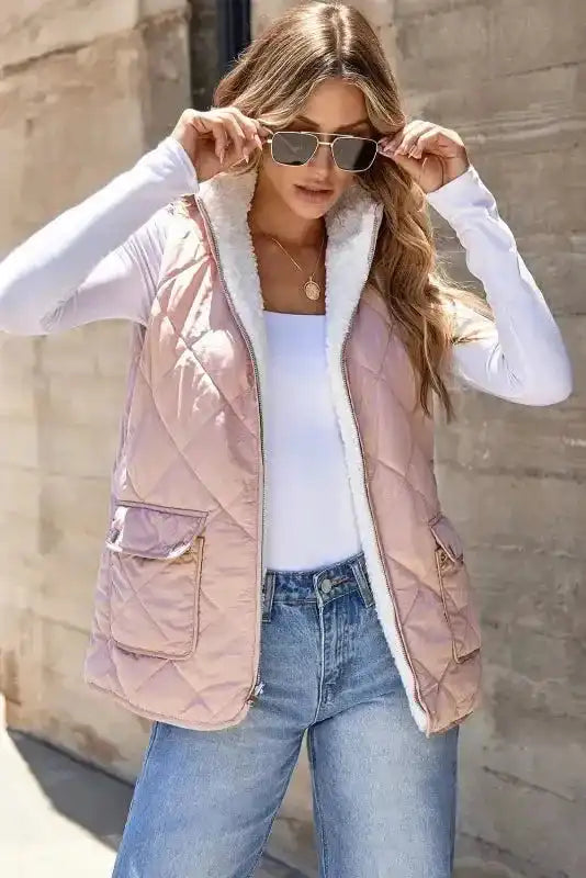 Women's Fleece Lined Quilted Vest Winter Gilet in pink by FashionFitz, open collar showing white fleece lining, ideal for cold weather layering.