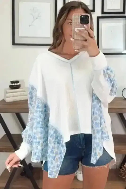 Side view of Abstract Floral Batwing Blouse showing batwing sleeve structure and waffle-textured fabric — Fashionfitz