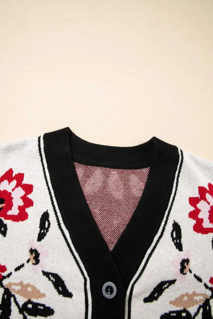 V-neckline detail of stretchable knit cardigan in soft beige