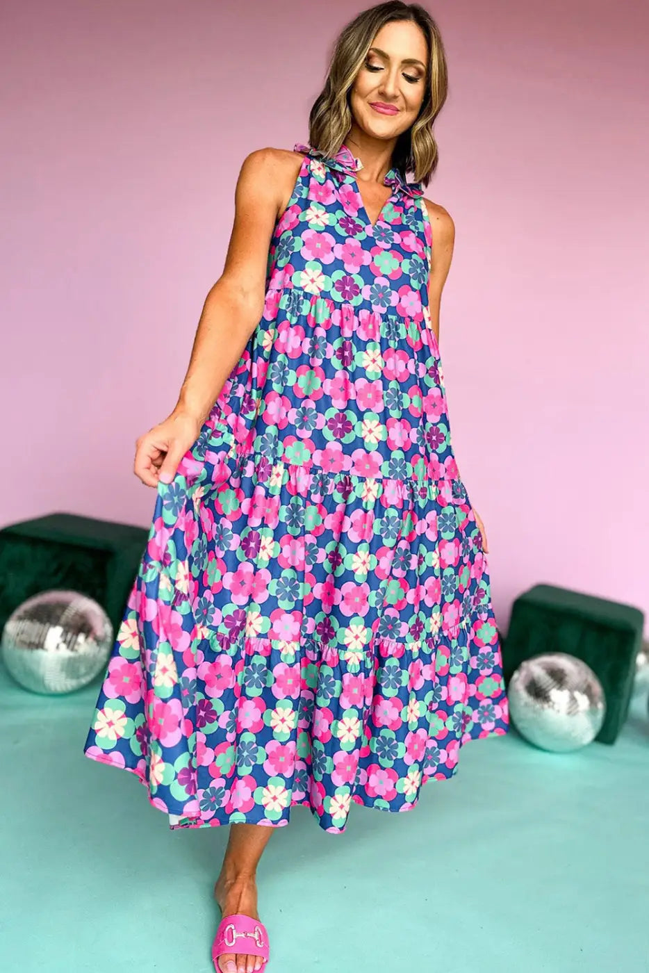 Floral cascade summer dress: colorful floral-print sleeveless maxi with tiered skirt, high neckline