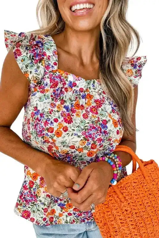 Close-up of Floral Flutter Tank Top - Square Neck Style highlighting floral pattern and ruffle detail, perfect for warm weather fashion.