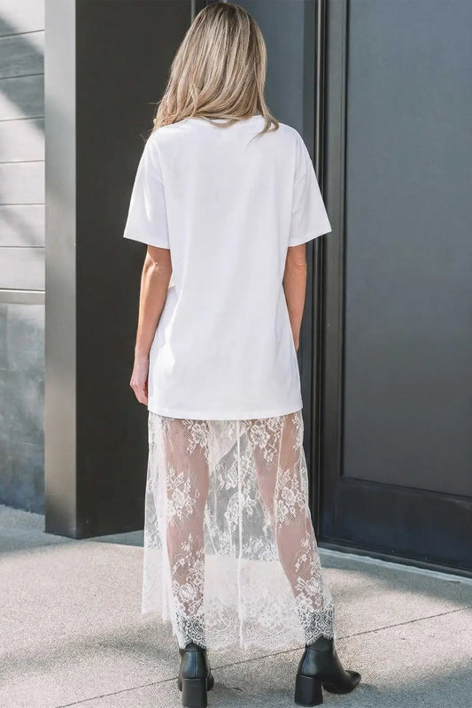 Back view of White Floral Lace Skirt Maxi Dress featuring a sheer floral lace overlay and relaxed fit, ideal for elegant daily wear.
