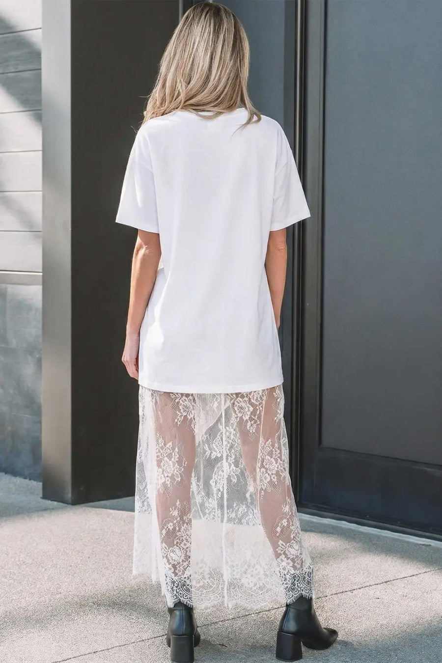 Back view of White Floral Lace Skirt Maxi Dress featuring a sheer floral lace overlay and relaxed fit, ideal for elegant daily wear.