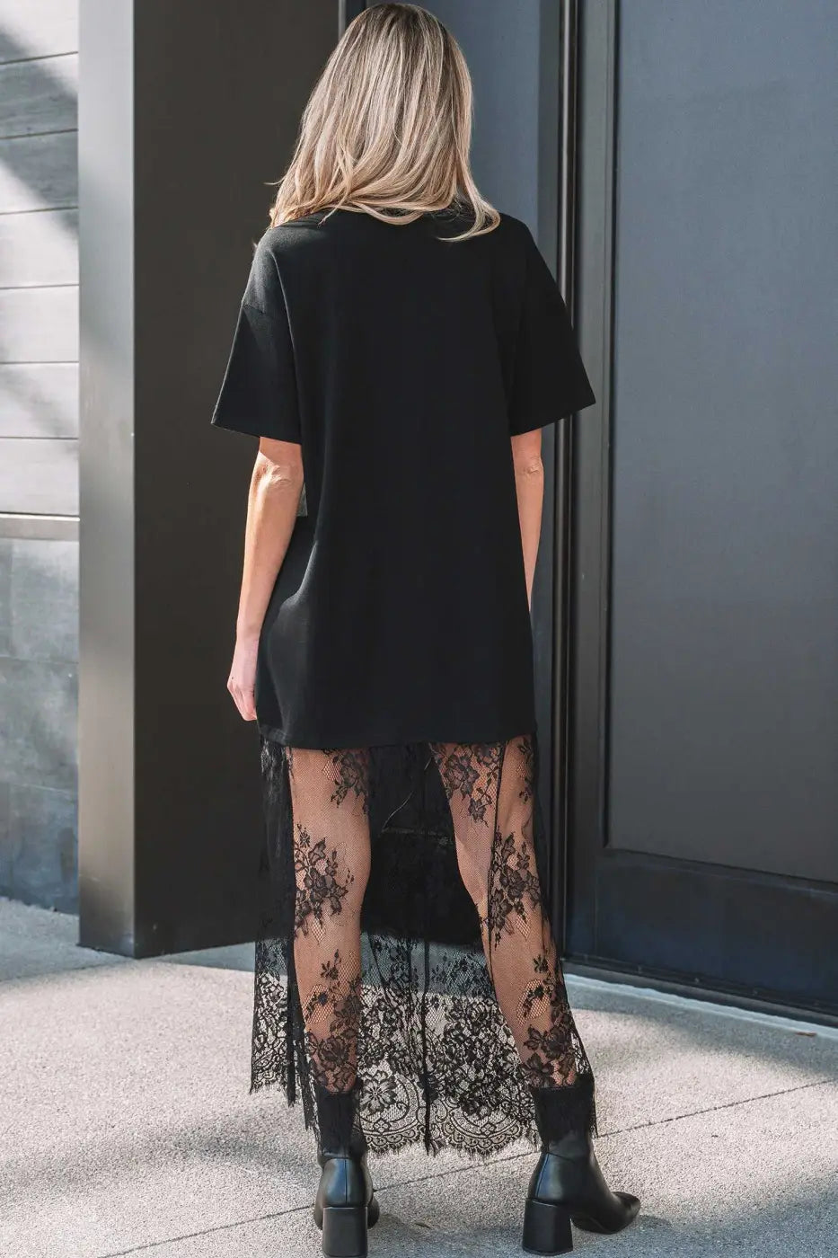 Back view of Black Floral Lace Skirt Maxi Dress highlighting the intricate lace detail and relaxed fit for daily elegance.