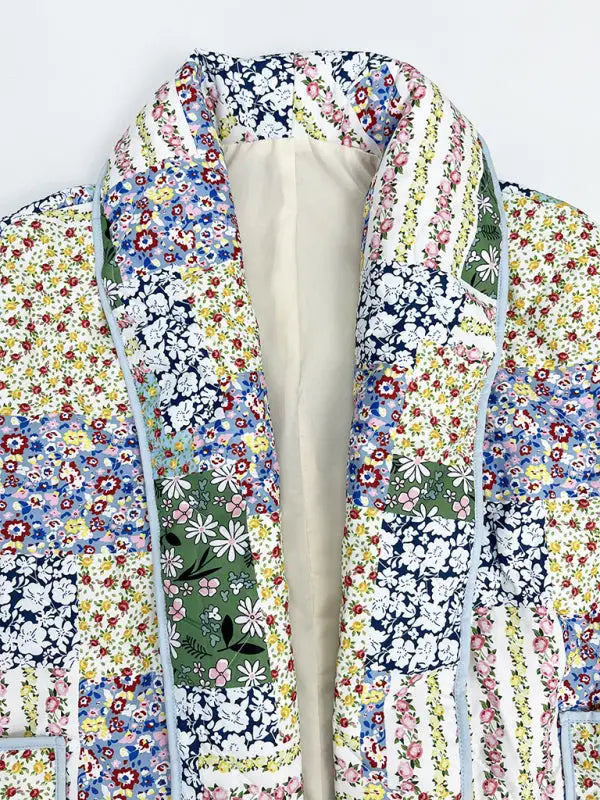 Floral print quilted sleeveless jacket