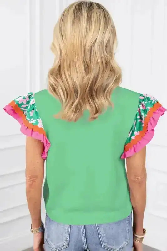 Back view of Light Green Floral Sleeve Contrast Ricrac Top showing relaxed fit and floral sleeve construction — Fashionfitz
