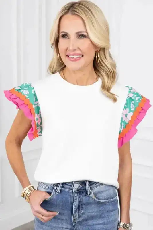 Close-up of White Floral Sleeve Contrast Ricrac Top showing distinctive zigzag ricrac trim on floral sleeve — Fashionfitz