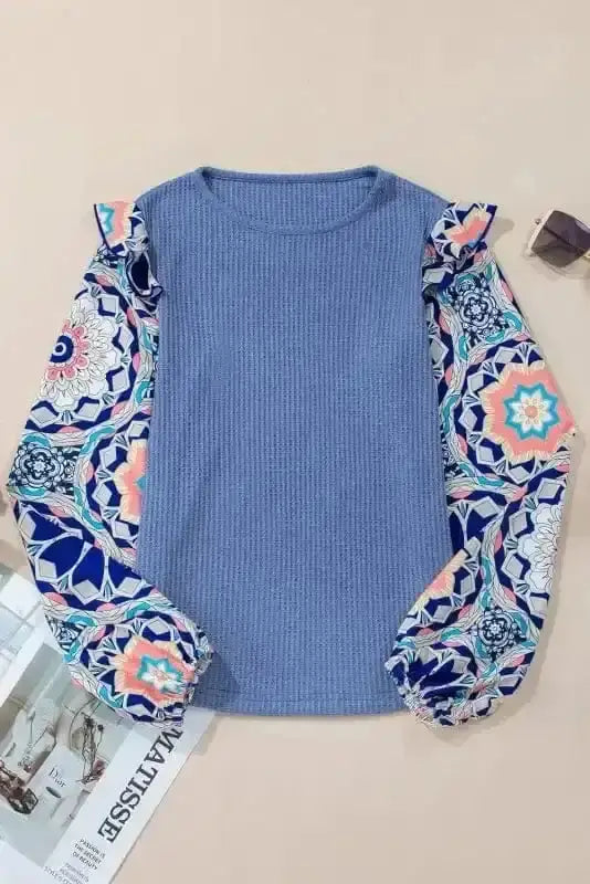 Side view of Floral Sleeve Waffle Knit Blouse showing ruffled detail and contrast between waffle body and floral sleeve — Fashionfitz