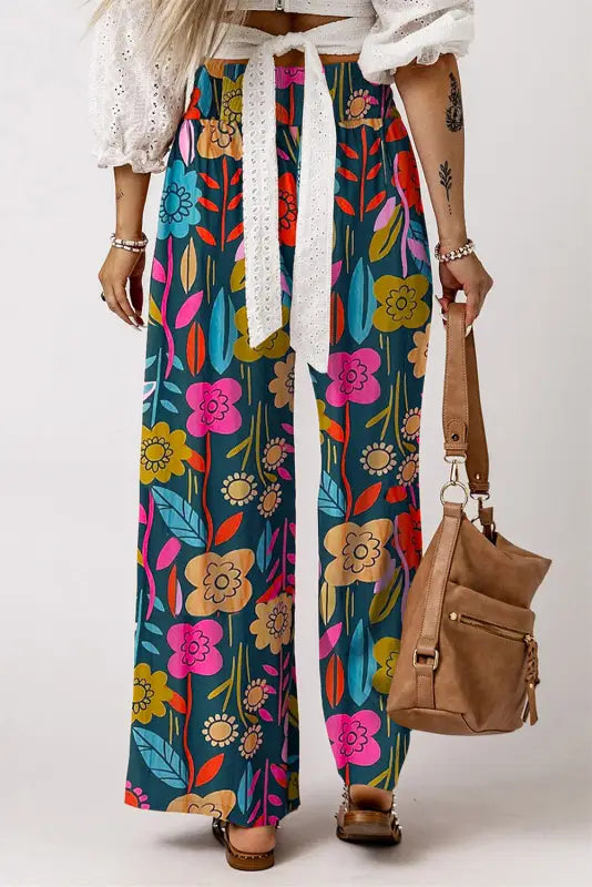 Floral smocked waist loose pants: relax in vibrant, tropical wide-leg floral-patterned pants