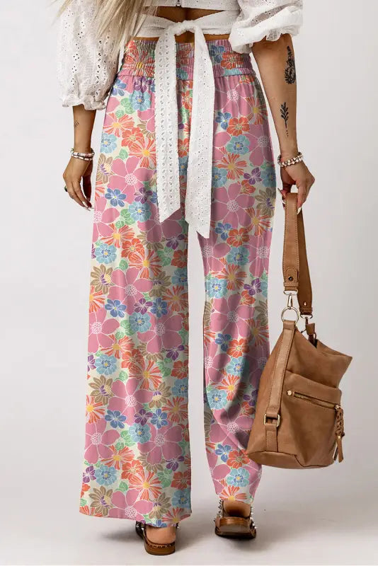 Floral smocked waist loose pants: floral print wide-leg pants with a white eyelet belt-relax