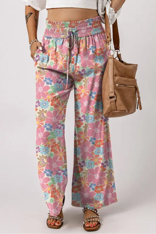 Floral smocked waist loose pants with relax fit and wide-leg design