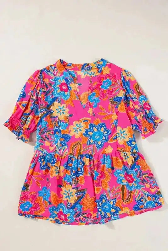 Side view of Rose Abstract Smocked Flowy Blouse showing smocked waist detail and airy movement — Fashionfitz