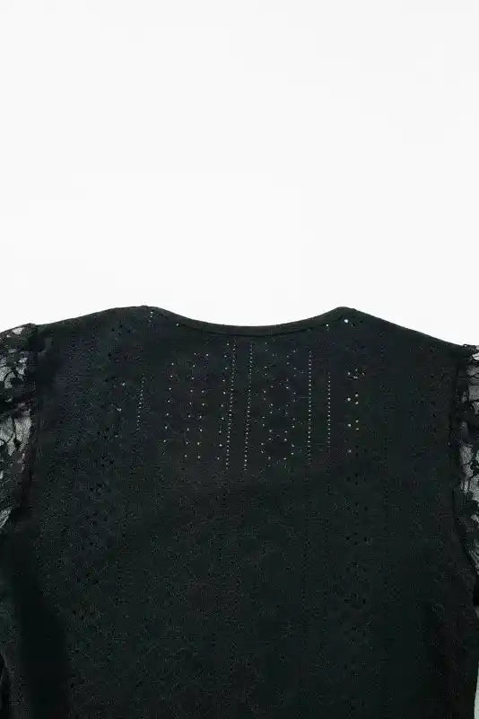 Back neckline detail of Lace Sleeve Bodysuit with intricate embroidery and sheer lace sleeves for a sophisticated finish.