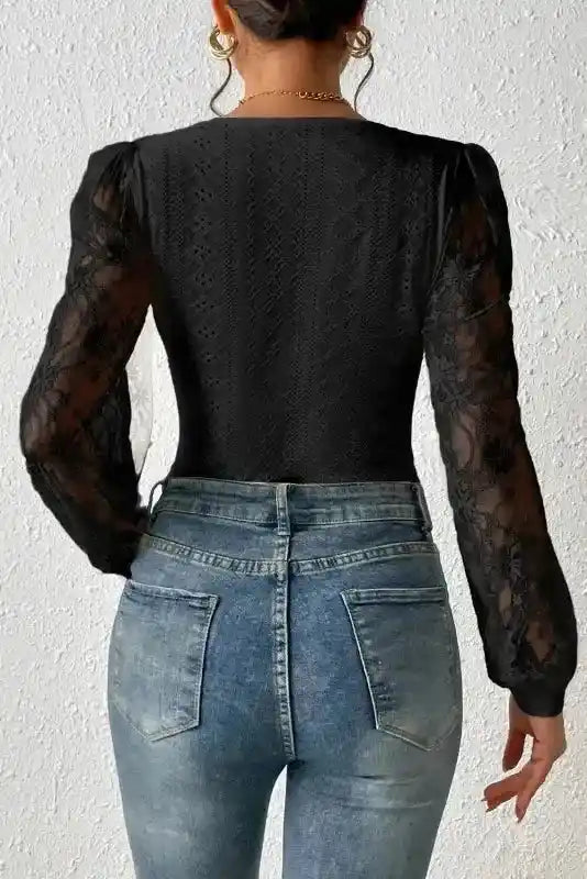 Back view of Elegant Lace Sleeve Bodysuit showing sheer floral sleeves and textured fabric, ideal for sophisticated styling.