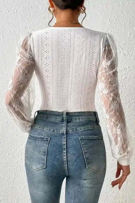 Rear view of Lace Sleeve Bodysuit worn with jeans, emphasizing the delicate lace sleeves and body-hugging design for daily elegance.