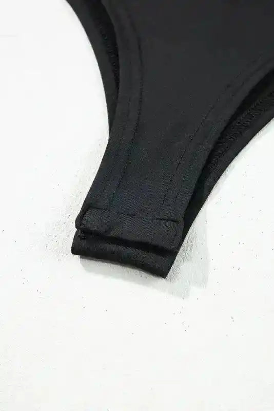 Snap closure detail of Elegant Lace Sleeve Bodysuit showing secure and comfortable fastening for daily wear.