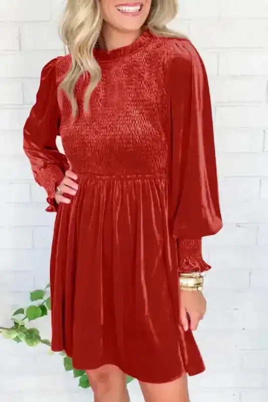 Frilled Neck Smocked Bodice Velvet Dress in red with long puff sleeves and A-line silhouette, perfect for winter elegance.