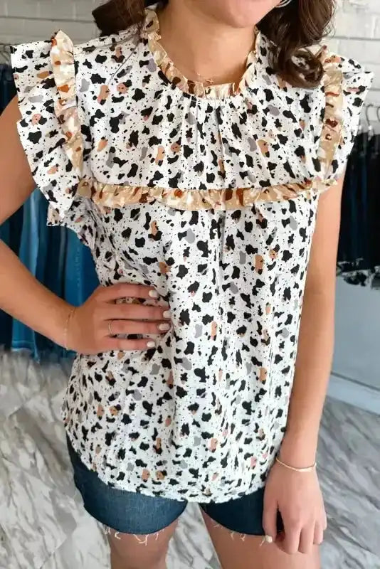 Back view of Leopard Print Flutter Sleeve Blouse showing frilly ruffle trim and relaxed shift silhouette — Fashionfitz