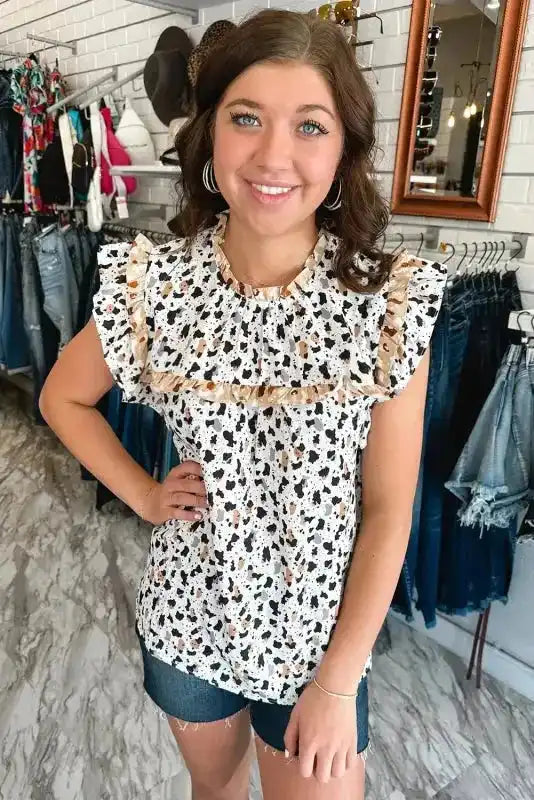 Full-length view of Leopard Flutter Sleeve Blouse styled for casual summer wear — Fashionfitz