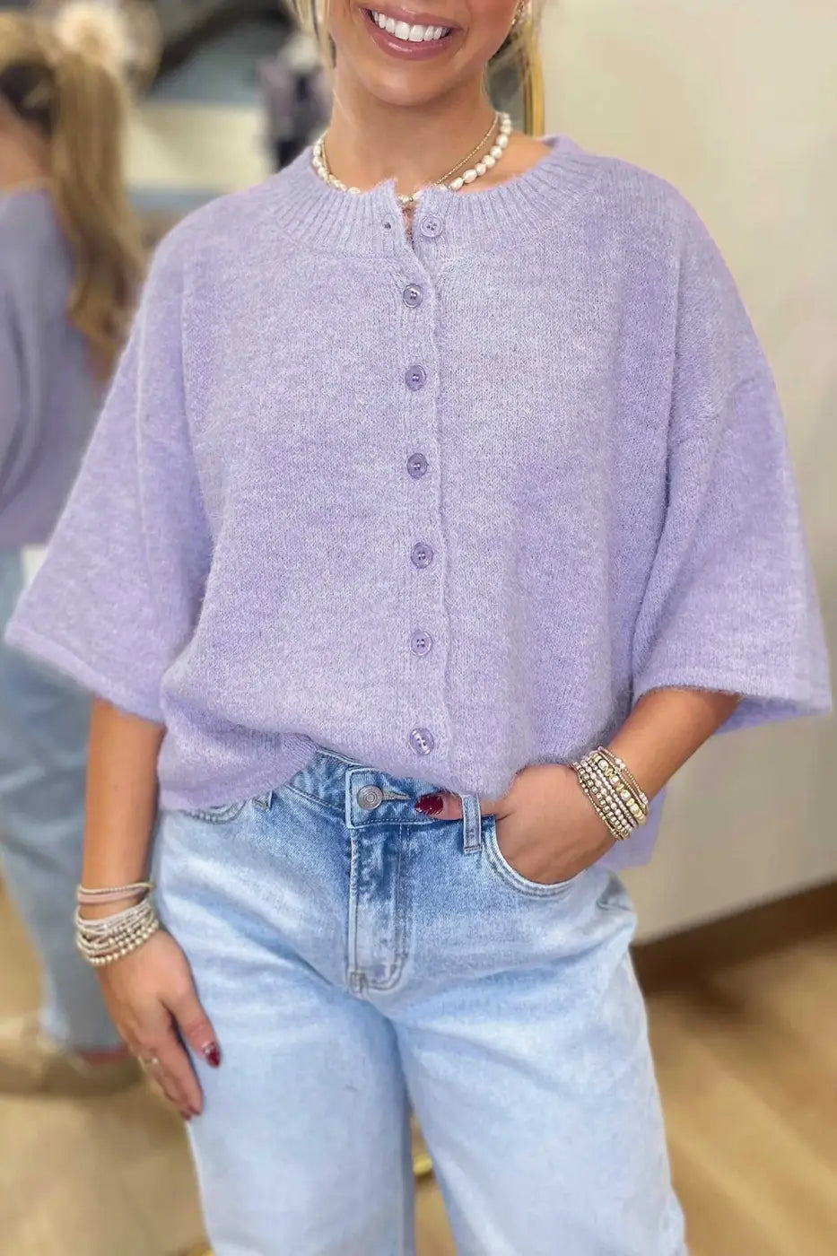 Pastel lavender fuzzy knit cardigan women with boxy fit and 3/4 sleeves, styled with high-waisted jeans for a cozy outfit.